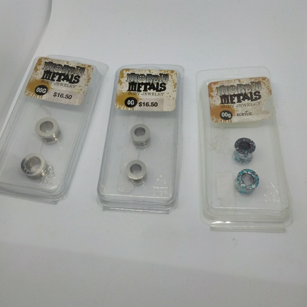 Three Morbid Metals ear guages (earrings spacers)